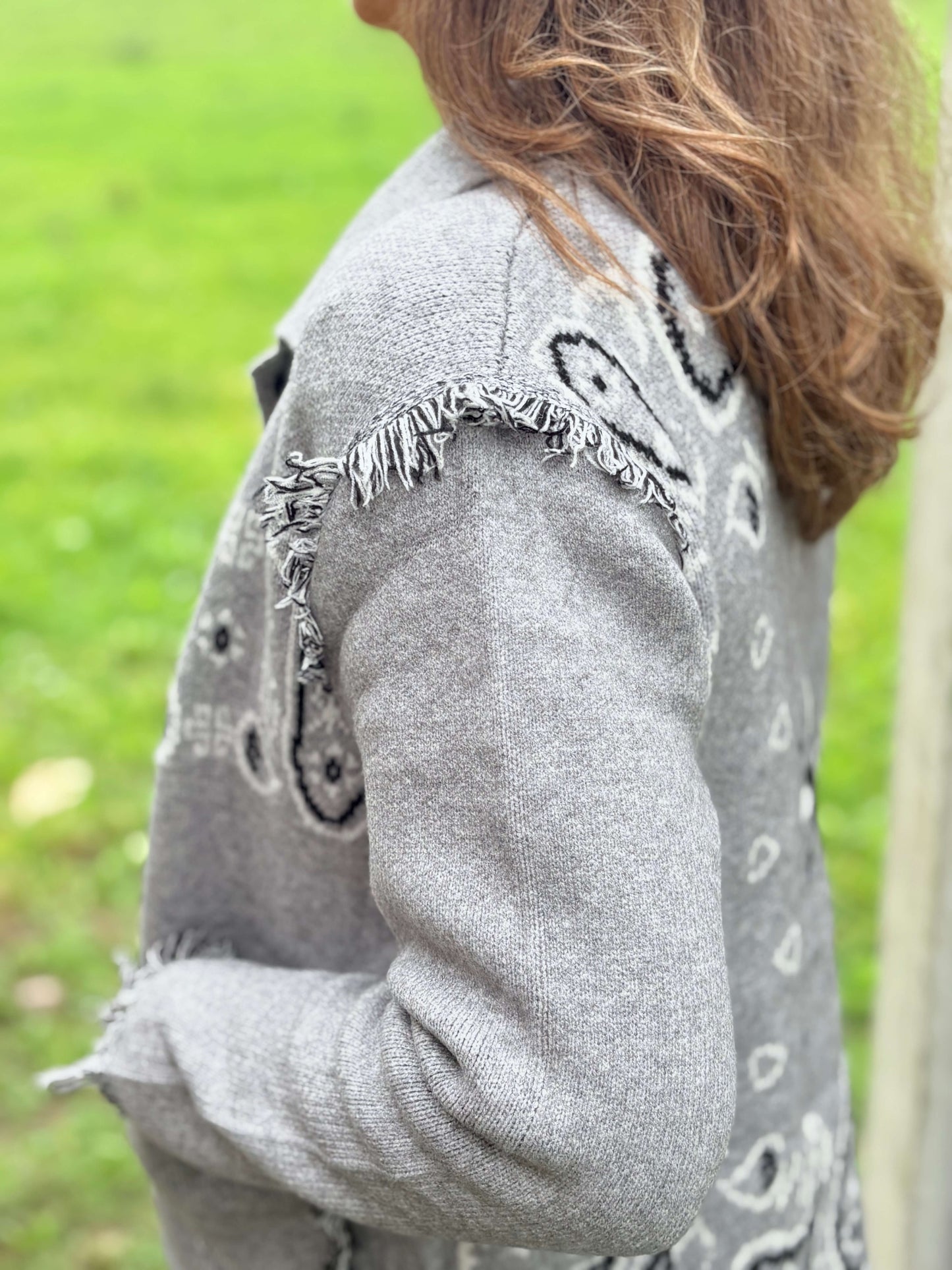 Détail épaule veste femme grise