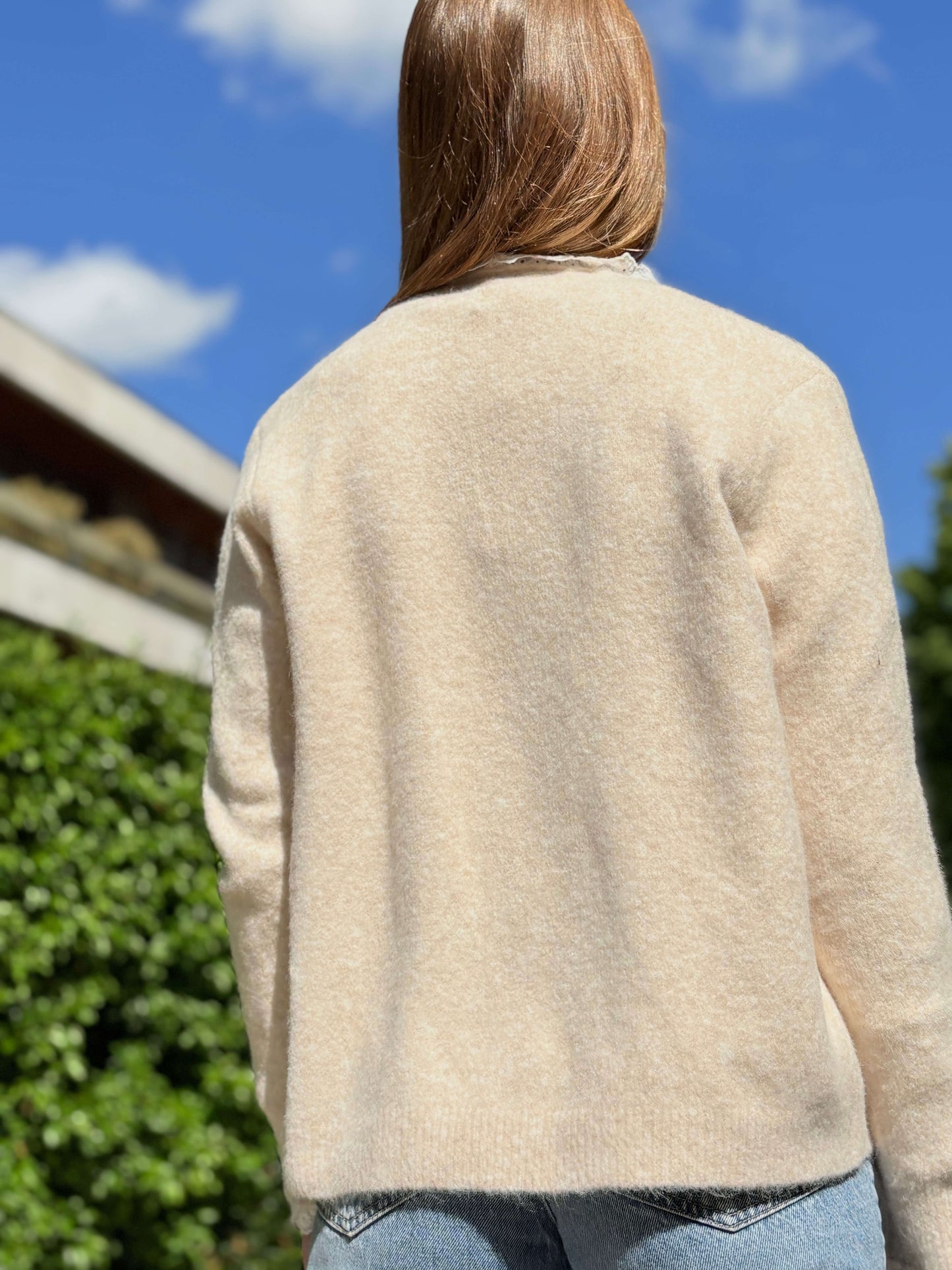 Gilet beige femme porté dos