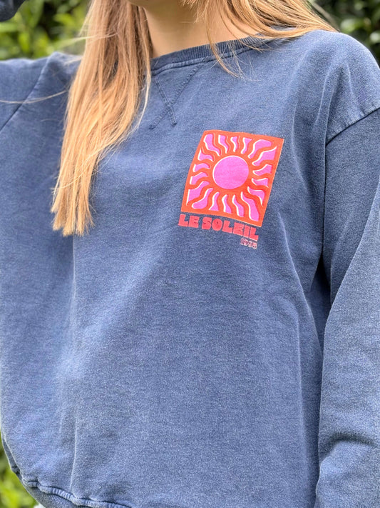 Sweat bleu marine femme avec imprimé soleil tendance sur le devant