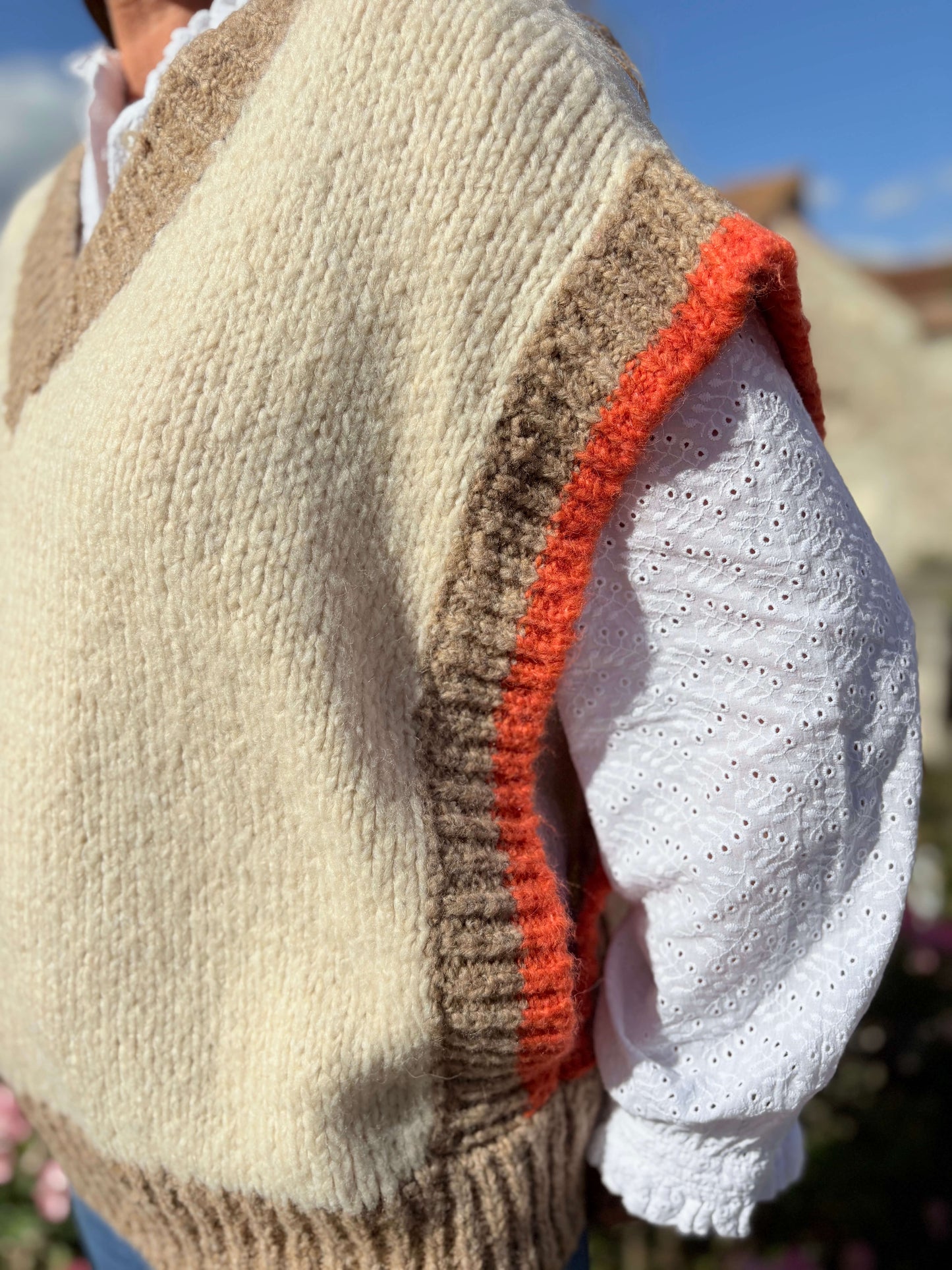 Manches pull sans manches en maille épaisse avec détails orange