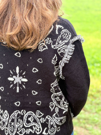 Détail dos veste femme noire toute douce